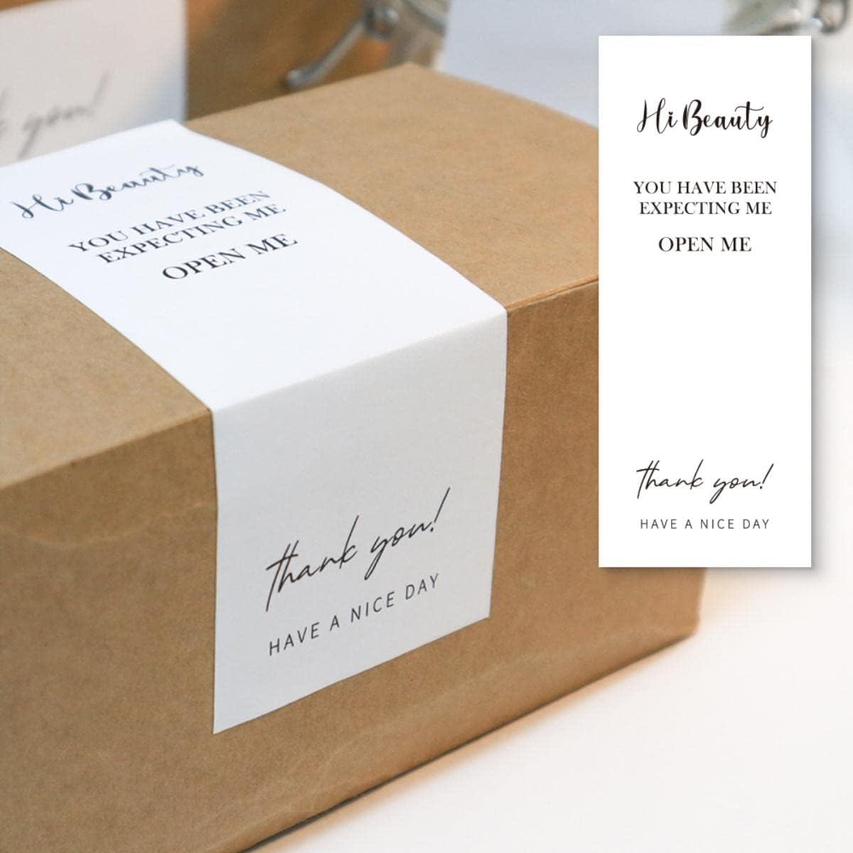 Thank you box labels on a brown cardboard box