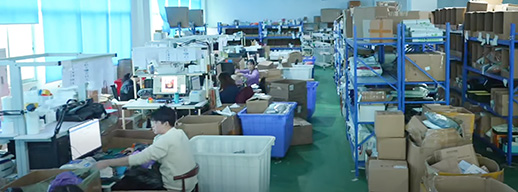 DongGuan warehouse interior with high racking and busy workers