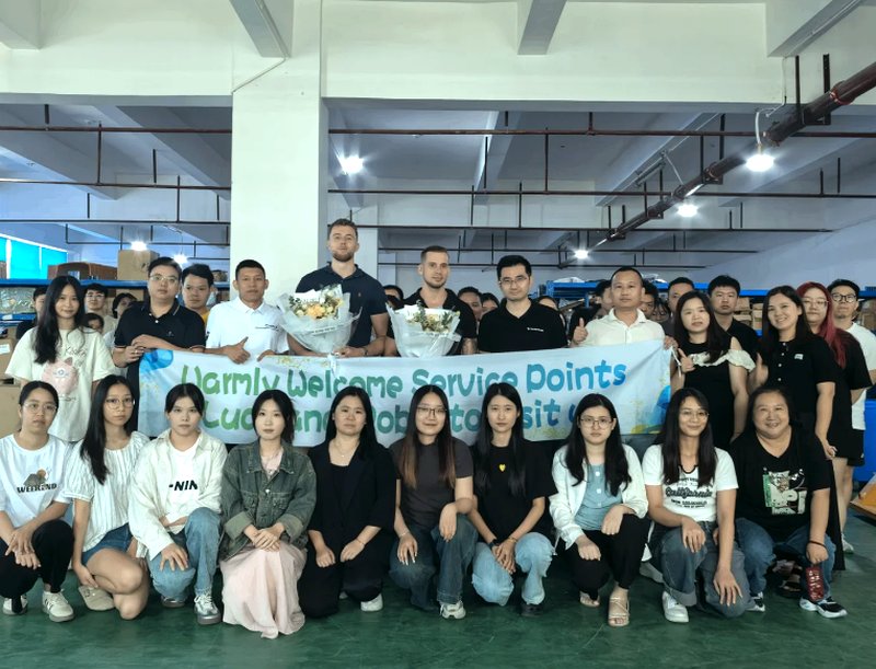 About Team & clients group photo at warehouse